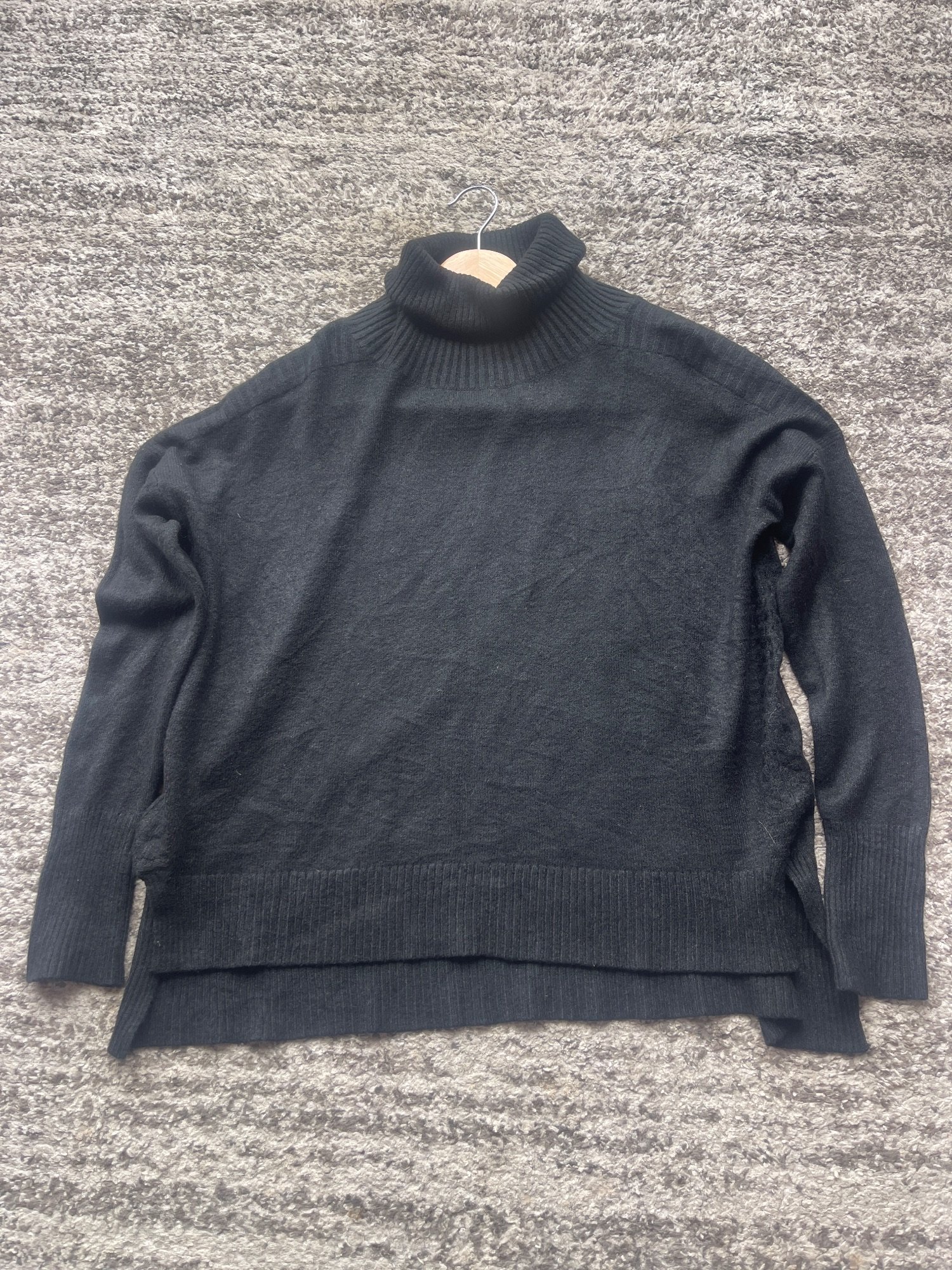 Pull col roulé noir · Taille M